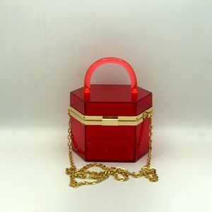 Red acrylic purse with chain strap